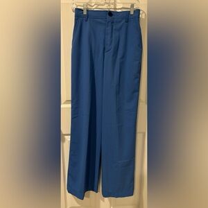 Zara wide leg pants with side pockets and back pockets with buttons.